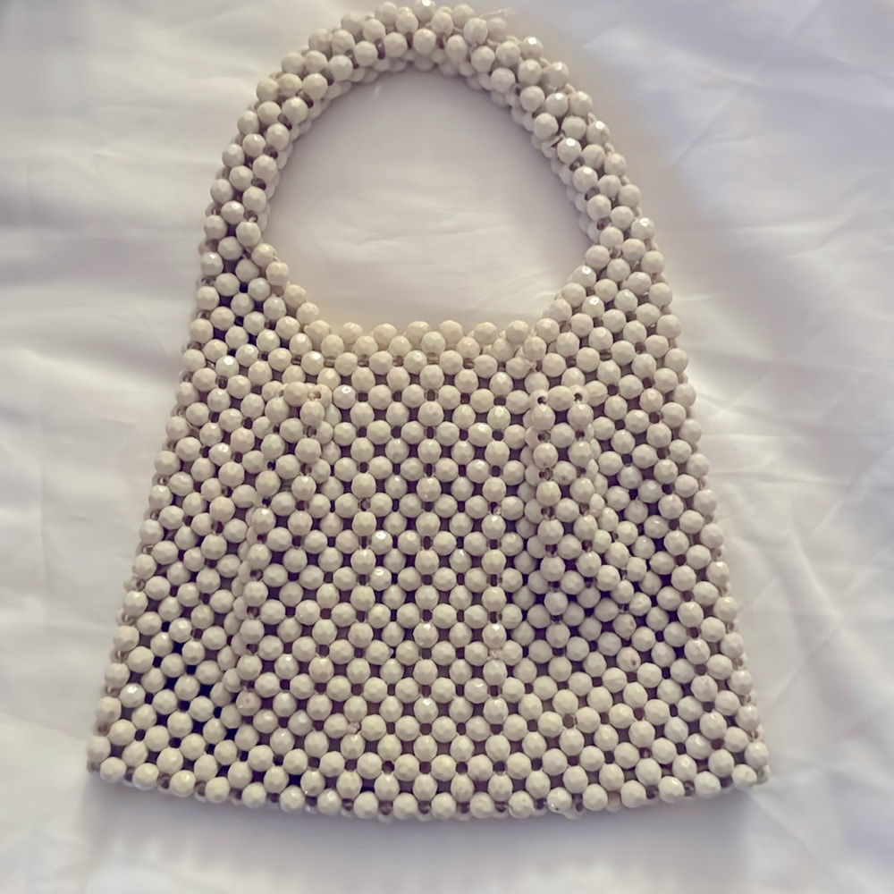 Vintage one of a kind small purse made in Italy out or beads, Brand name Delill